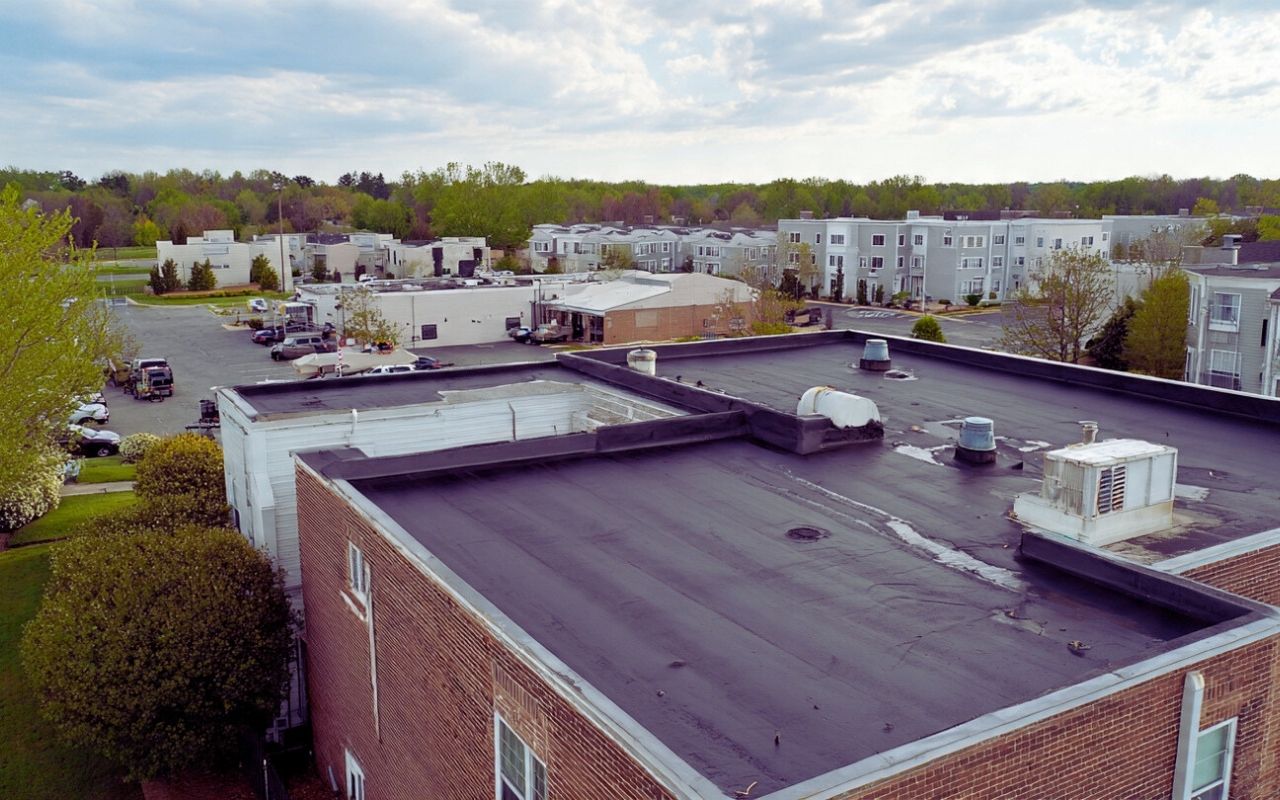 Flat roof repair in Spotsylvania County with professional leak tracing methods